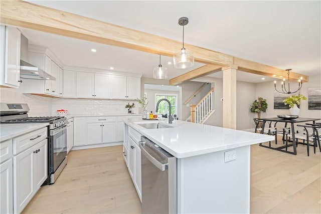 38 Richs Dugway Rd, Brighton, NY 14625 - kitchen with appliances with stainless steel finishes, range hood, recessed lighting, decorative backsplash, and beam ceiling