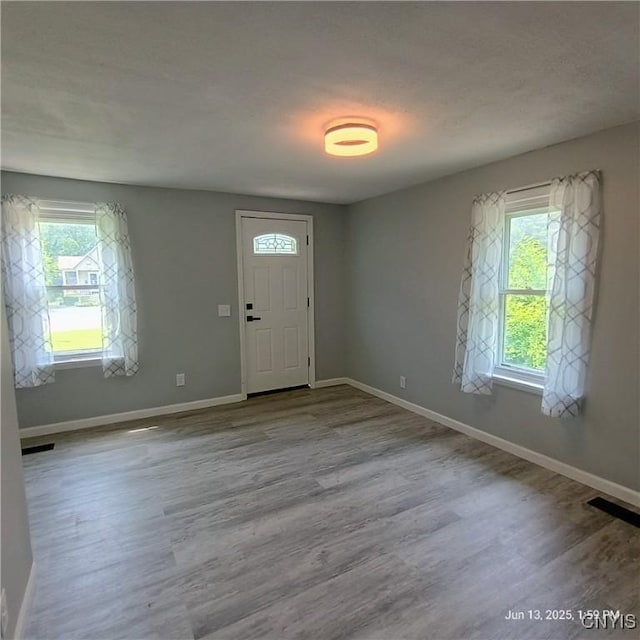504 Breman Ave, Salina, NY 13211 - entrance foyer featuring baseboards and wood finished floors
