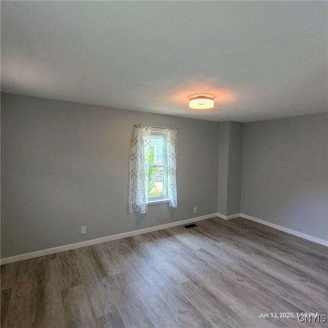 504 Breman Ave, Salina, NY 13211 - unfurnished room with wood finished floors
