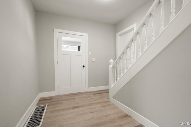 321 Pleasant Ave, Oneida-Inside, NY 13421 - entrance foyer featuring stairs and wood finished floors