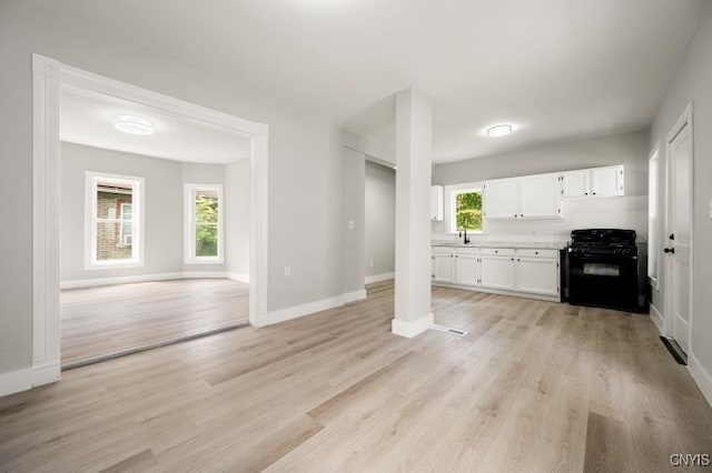 321 Pleasant Ave, Oneida-Inside, NY 13421 - unfurnished living room featuring light wood finished floors
