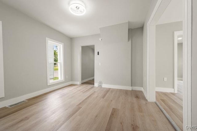 321 Pleasant Ave, Oneida-Inside, NY 13421 - empty room with light wood-style flooring and baseboards