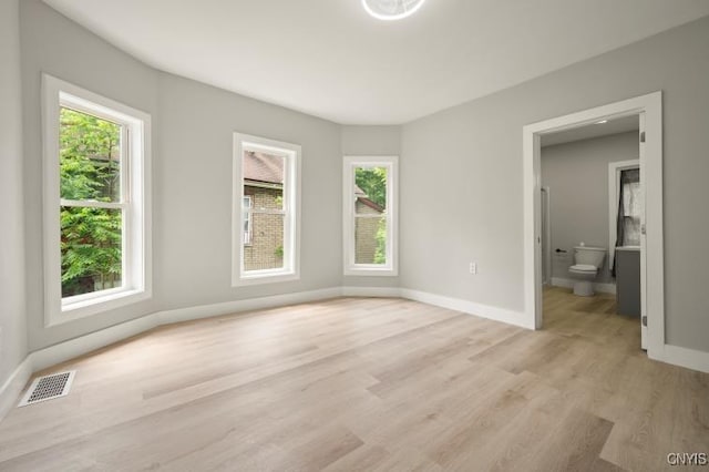321 Pleasant Ave, Oneida-Inside, NY 13421 - empty room with light wood-style floors and baseboards