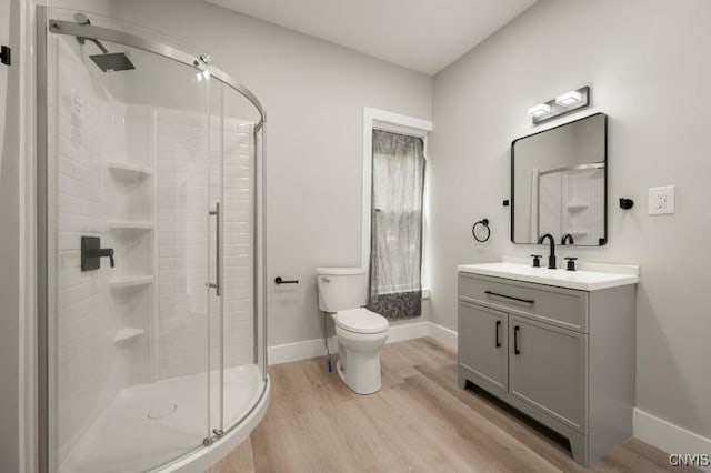 321 Pleasant Ave, Oneida-Inside, NY 13421 - bathroom featuring a shower stall, wood finished floors, and vanity