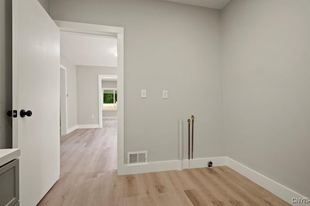 321 Pleasant Ave, Oneida-Inside, NY 13421 - laundry area with light wood-type flooring