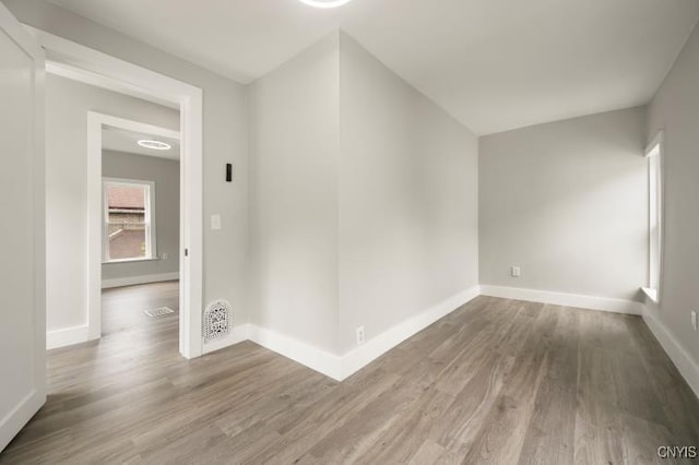 321 Pleasant Ave, Oneida-Inside, NY 13421 - spare room with wood finished floors and baseboards