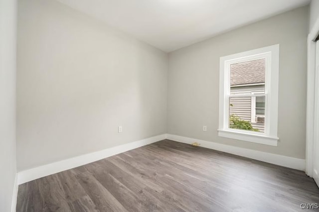 321 Pleasant Ave, Oneida-Inside, NY 13421 - spare room featuring wood finished floors and baseboards