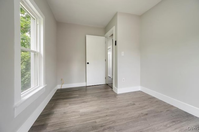 321 Pleasant Ave, Oneida-Inside, NY 13421 - unfurnished bedroom with baseboards and wood finished floors
