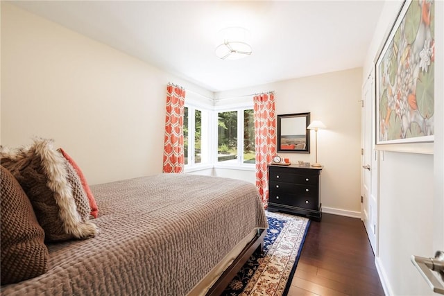 5 Elmwood Hill Ln, Brighton, NY 14610 - bedroom with dark wood-type flooring and baseboards
