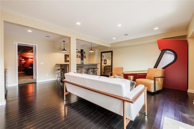 5 Elmwood Hill Ln, Brighton, NY 14610 - living area featuring wood finished floors, recessed lighting, and bar area