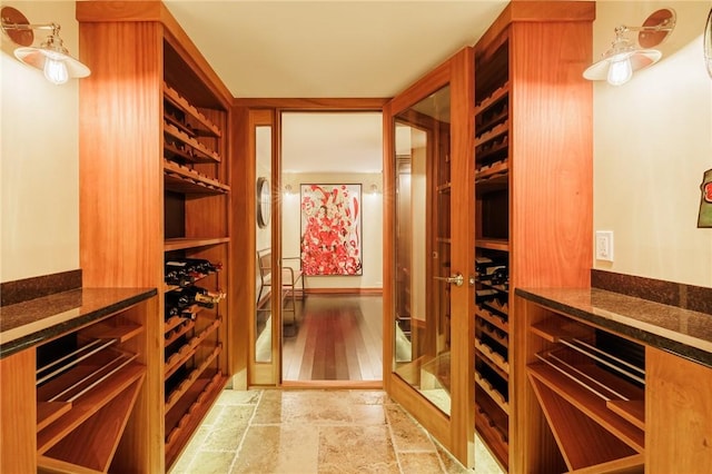 5 Elmwood Hill Ln, Brighton, NY 14610 - wine room with stone finish flooring
