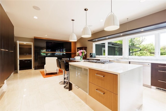 5 Elmwood Hill Ln, Brighton, NY 14610 - kitchen with modern cabinets, dishwasher, stainless steel gas cooktop, light countertops, and a large island