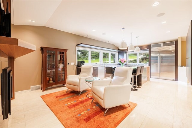 5 Elmwood Hill Ln, Brighton, NY 14610 - living room with lofted ceiling, light tile patterned flooring, and recessed lighting