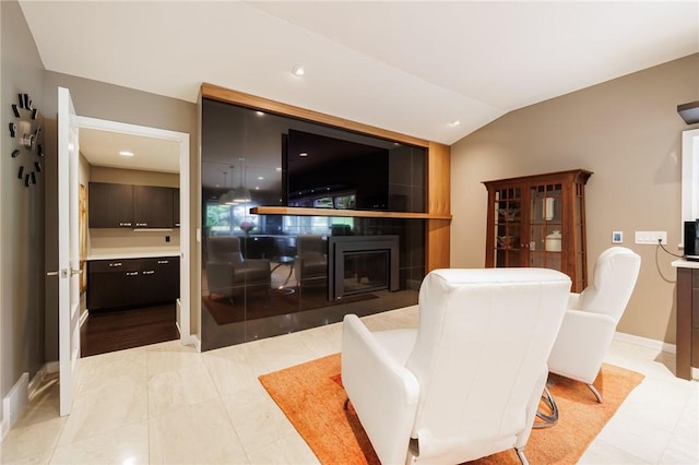 5 Elmwood Hill Ln, Brighton, NY 14610 - living area with a glass covered fireplace, light tile patterned floors, lofted ceiling, and recessed lighting