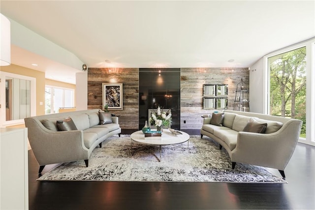 5 Elmwood Hill Ln, Brighton, NY 14610 - living area with an accent wall, plenty of natural light, wooden walls, and lofted ceiling