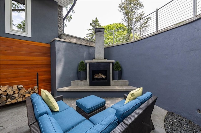 5 Elmwood Hill Ln, Brighton, NY 14610 - view of patio featuring an outdoor living space with a fireplace