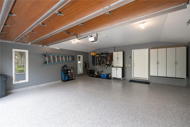 5 Elmwood Hill Ln, Brighton, NY 14610 - garage with a garage door opener