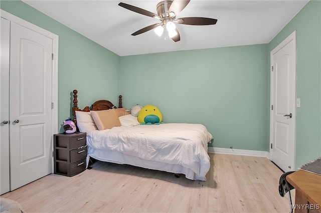2391 Hess Rd, Newfane, NY 14008 - bedroom featuring wood finished floors and a ceiling fan