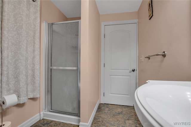 2391 Hess Rd, Newfane, NY 14008 - bathroom featuring a stall shower and stone finish flooring