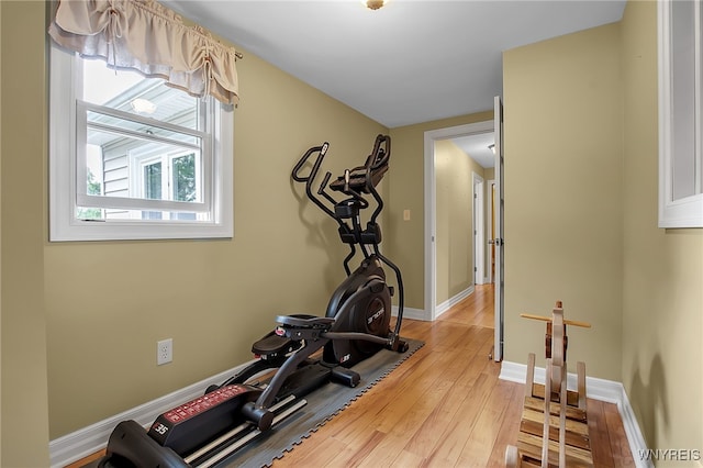 2391 Hess Rd, Newfane, NY 14008 - workout area featuring light wood-style flooring and baseboards