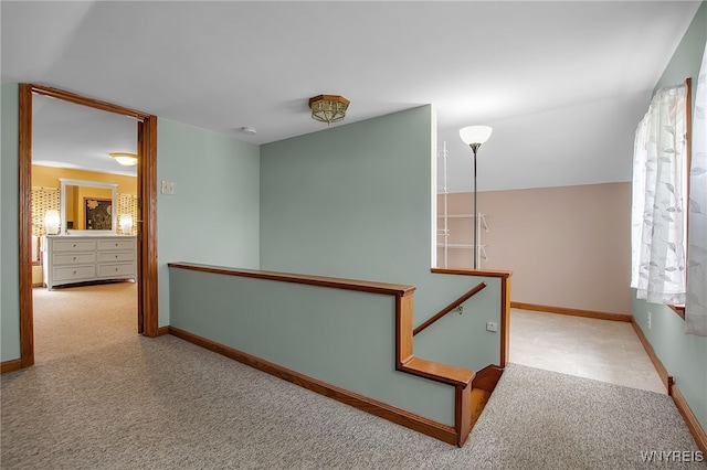 2391 Hess Rd, Newfane, NY 14008 - corridor with an upstairs landing and carpet flooring