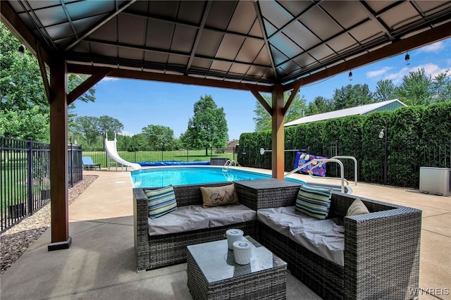 2391 Hess Rd, Newfane, NY 14008 - fenced backyard with a gazebo, a patio area, and outdoor lounge area