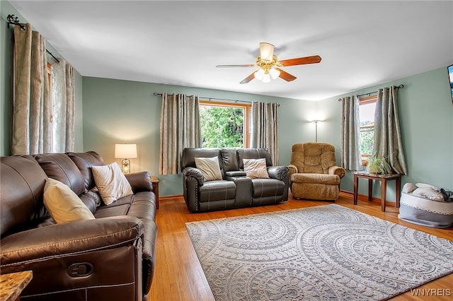 2391 Hess Rd, Newfane, NY 14008 - living room featuring ceiling fan and wood finished floors