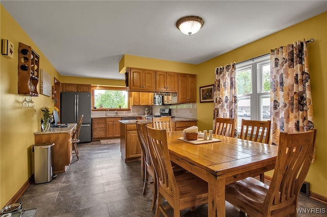 2391 Hess Rd, Newfane, NY 14008 - dining room with baseboards