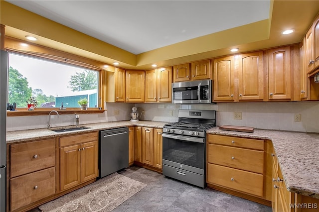 2391 Hess Rd, Newfane, NY 14008 - kitchen with appliances with stainless steel finishes, light stone counters, backsplash, and recessed lighting