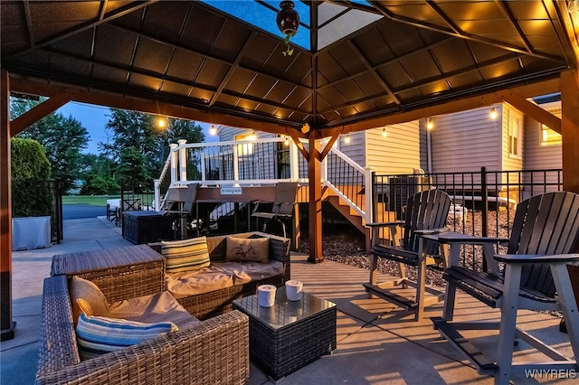 2391 Hess Rd, Newfane, NY 14008 - wooden deck with stairs, a gazebo, and an outdoor living space