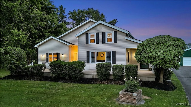 2391 Hess Rd, Newfane, NY 14008 - traditional-style house with a yard and a detached garage