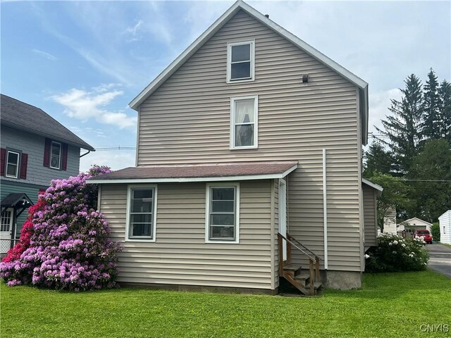 41 Evergreen St, Cortland, NY 13045 - back of property with entry steps and a yard