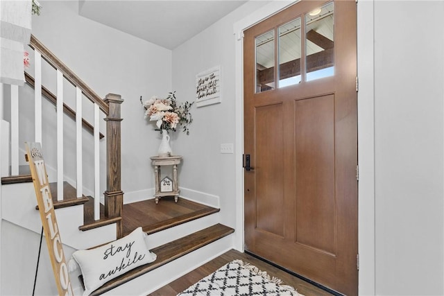 591 Whistlers Cove Ln, Greece, NY 14612 - entryway featuring stairway and wood finished floors