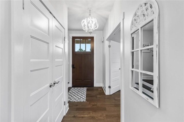 591 Whistlers Cove Ln, Greece, NY 14612 - foyer with a chandelier and wood finished floors