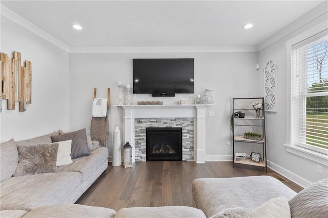 591 Whistlers Cove Ln, Greece, NY 14612 - living area featuring ornamental molding, wood finished floors, a stone fireplace, and recessed lighting
