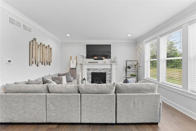 591 Whistlers Cove Ln, Greece, NY 14612 - living area featuring a fireplace, recessed lighting, ornamental molding, and wood finished floors