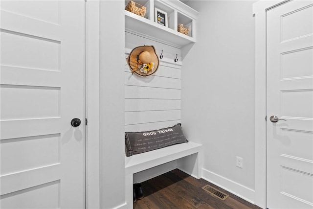 591 Whistlers Cove Ln, Greece, NY 14612 - mudroom with dark wood finished floors and baseboards