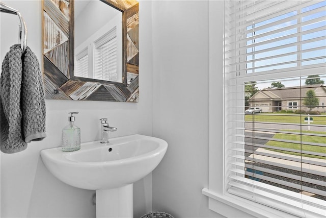 591 Whistlers Cove Ln, Greece, NY 14612 - bathroom featuring a sink