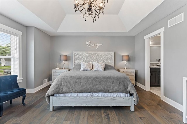 591 Whistlers Cove Ln, Greece, NY 14612 - bedroom featuring a raised ceiling, a chandelier, dark wood-style flooring, and ensuite bathroom