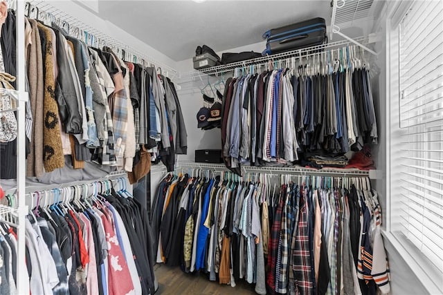 591 Whistlers Cove Ln, Greece, NY 14612 - spacious closet featuring wood finished floors