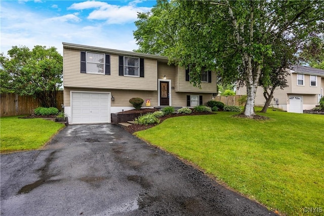 8185 Mantova Dr, Clay, NY 13041 - split foyer home with an attached garage and driveway