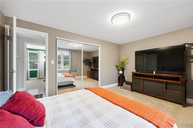 8185 Mantova Dr, Clay, NY 13041 - bedroom with carpet flooring and a closet