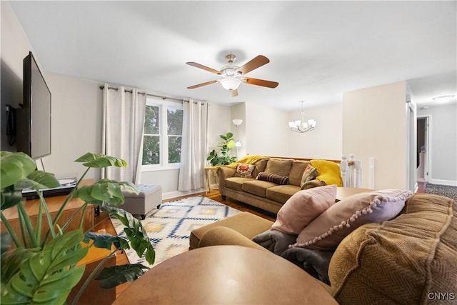 8185 Mantova Dr, Clay, NY 13041 - living room with a ceiling fan and a chandelier