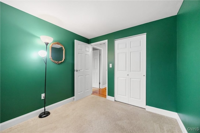8185 Mantova Dr, Clay, NY 13041 - unfurnished bedroom with carpet floors and a closet