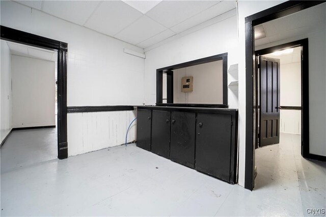 151 Oak St, Syracuse, NY 13203 - corridor with concrete flooring and a drop ceiling