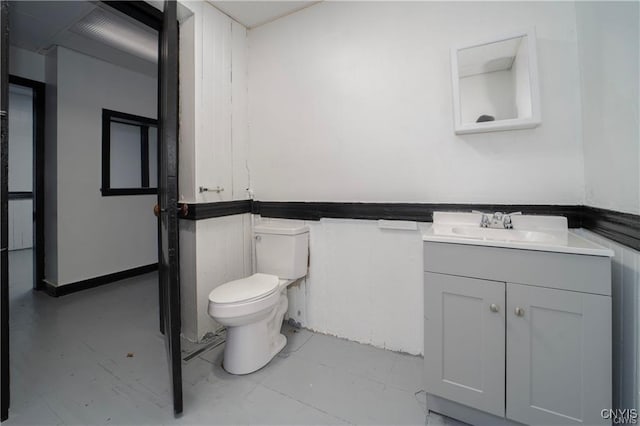 151 Oak St, Syracuse, NY 13203 - bathroom with vanity and a wainscoted wall