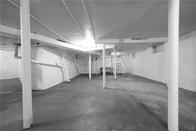 151 Oak St, Syracuse, NY 13203 - unfinished basement with stairway