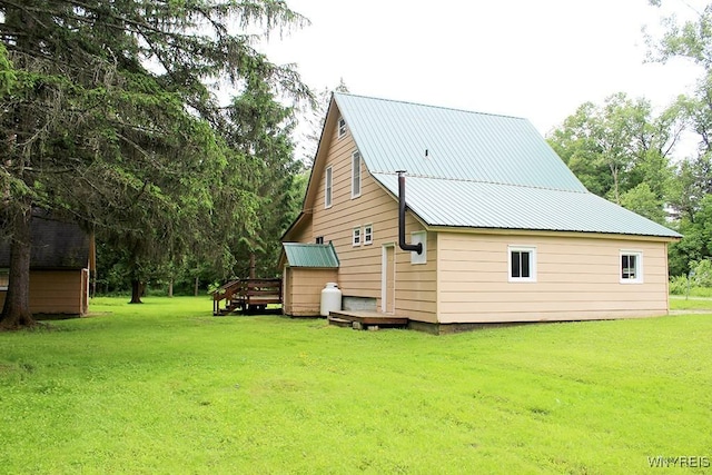 5046 Whig St, Little Valley, NY 14779 - back of property featuring a lawn, a deck, and a metal roof