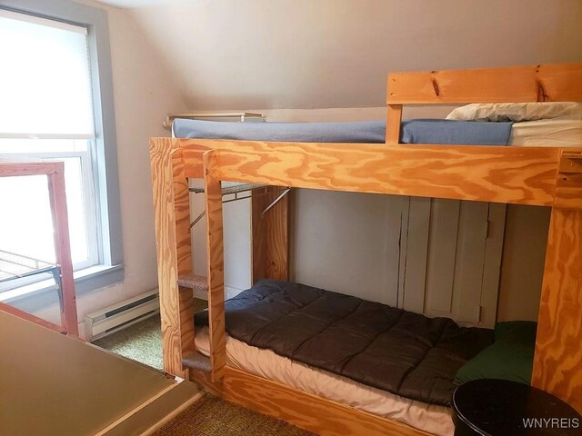 5046 Whig St, Little Valley, NY 14779 - bedroom with carpet floors, baseboard heating, and lofted ceiling