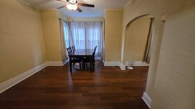 306 Broad St, Port Allegany Boro, PA 16743 - dining space featuring wood finished floors, arched walkways, ceiling fan, and ornamental molding